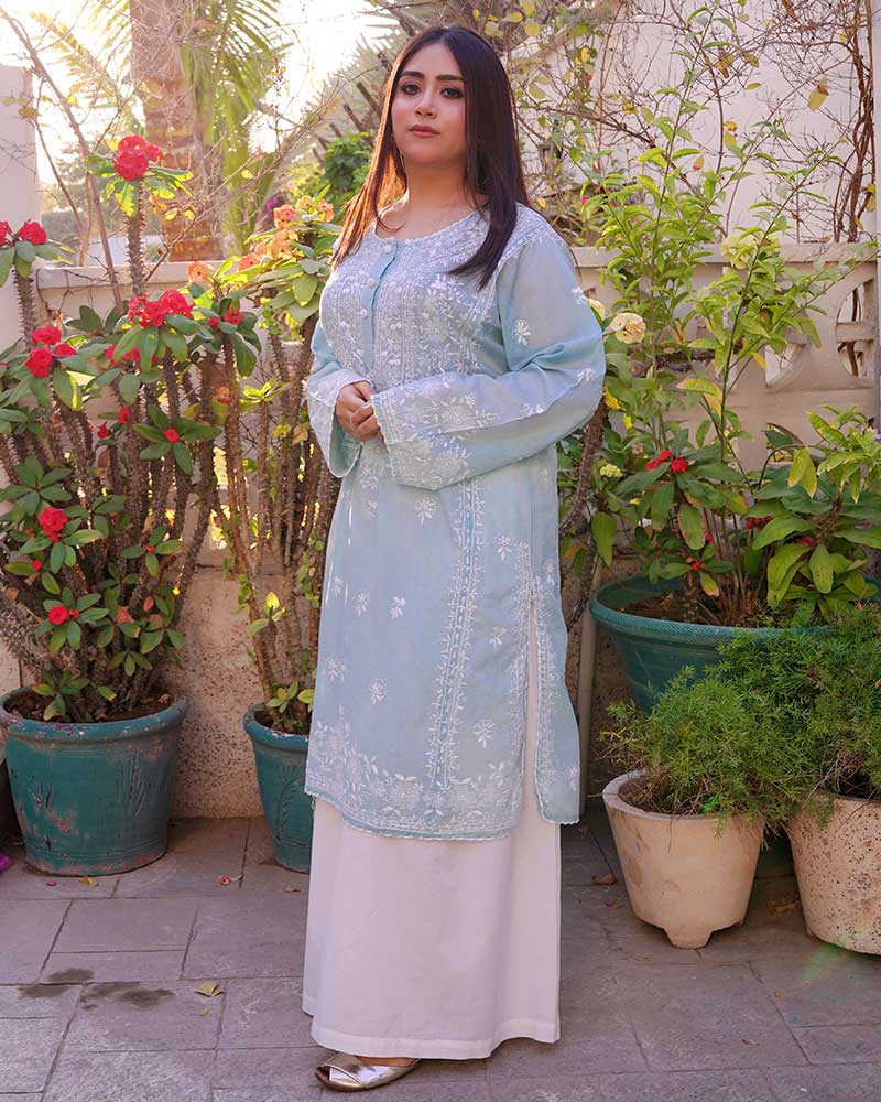 model posing in blue kurta
